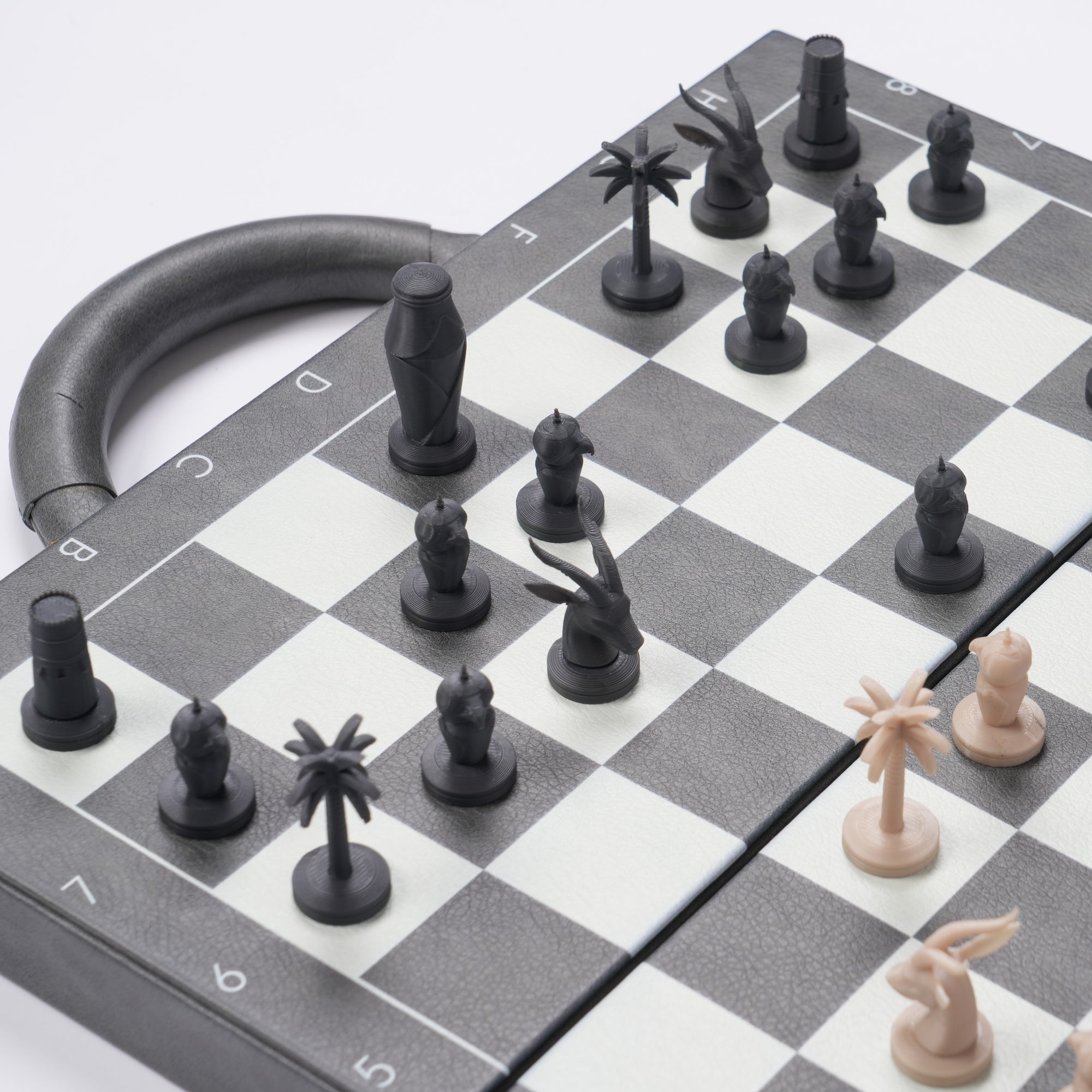 Tashkeel Chess Briefcase with sturdy handle and secure compartments for chess pieces and accessories.