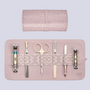 Tashkeel Herringbone Grooming Rolls with tan interior, featuring multiple compartments for organizing grooming tools.