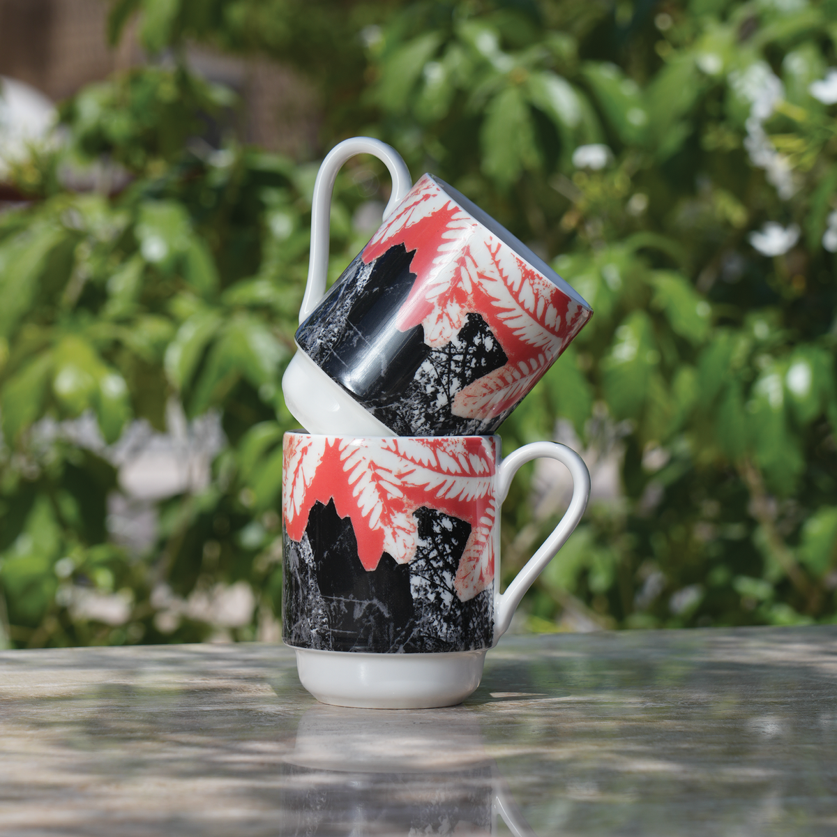 Ceramic mug featuring artwork by Moza Al Falasi from the Unfolding exhibition (view 2)