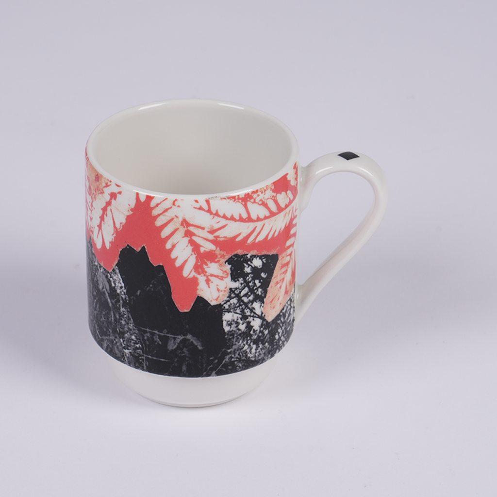 Ceramic mug featuring artwork by Moza Al Falasi from the Unfolding exhibition (view 3)