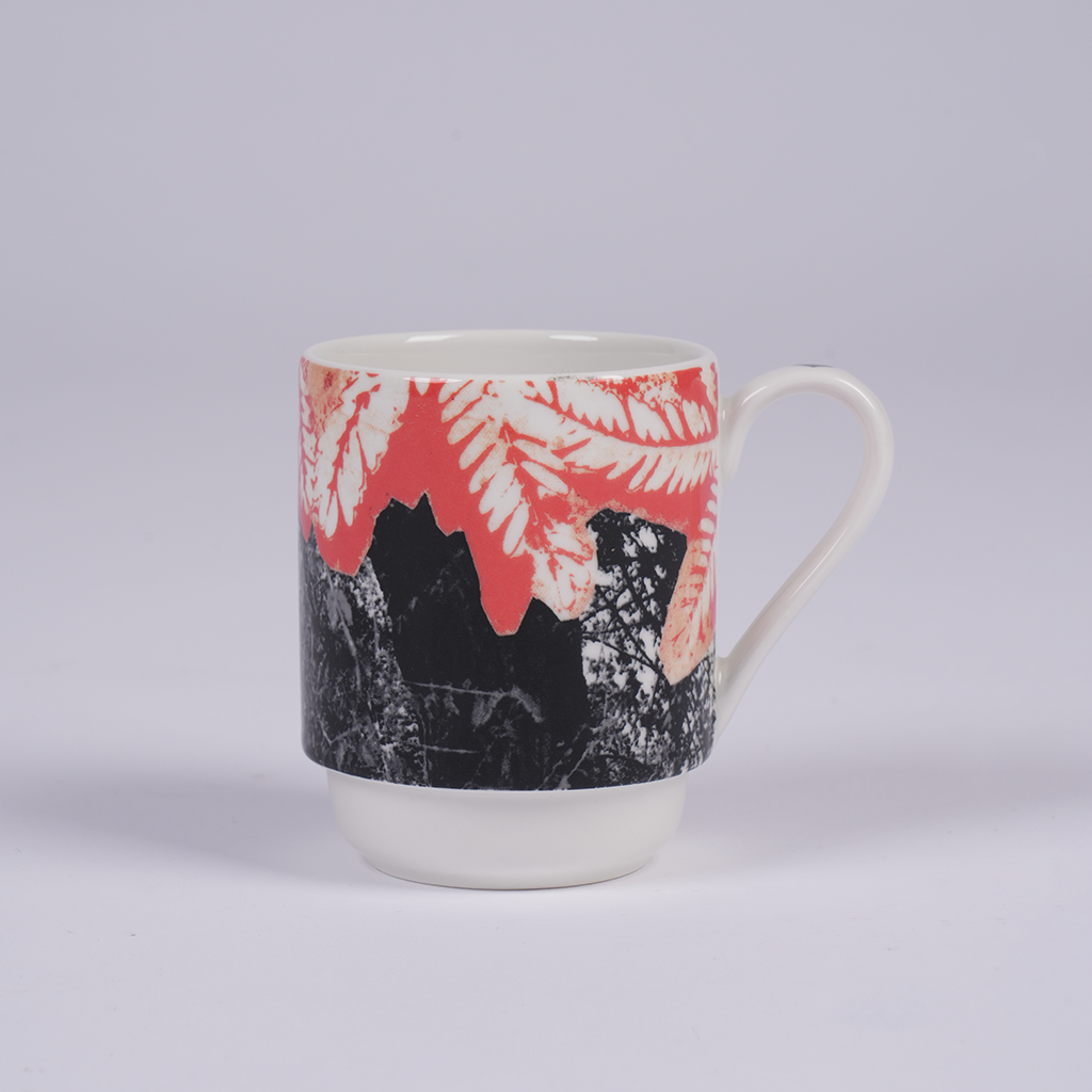 Ceramic mug featuring artwork by Moza Al Falasi from the Unfolding exhibition