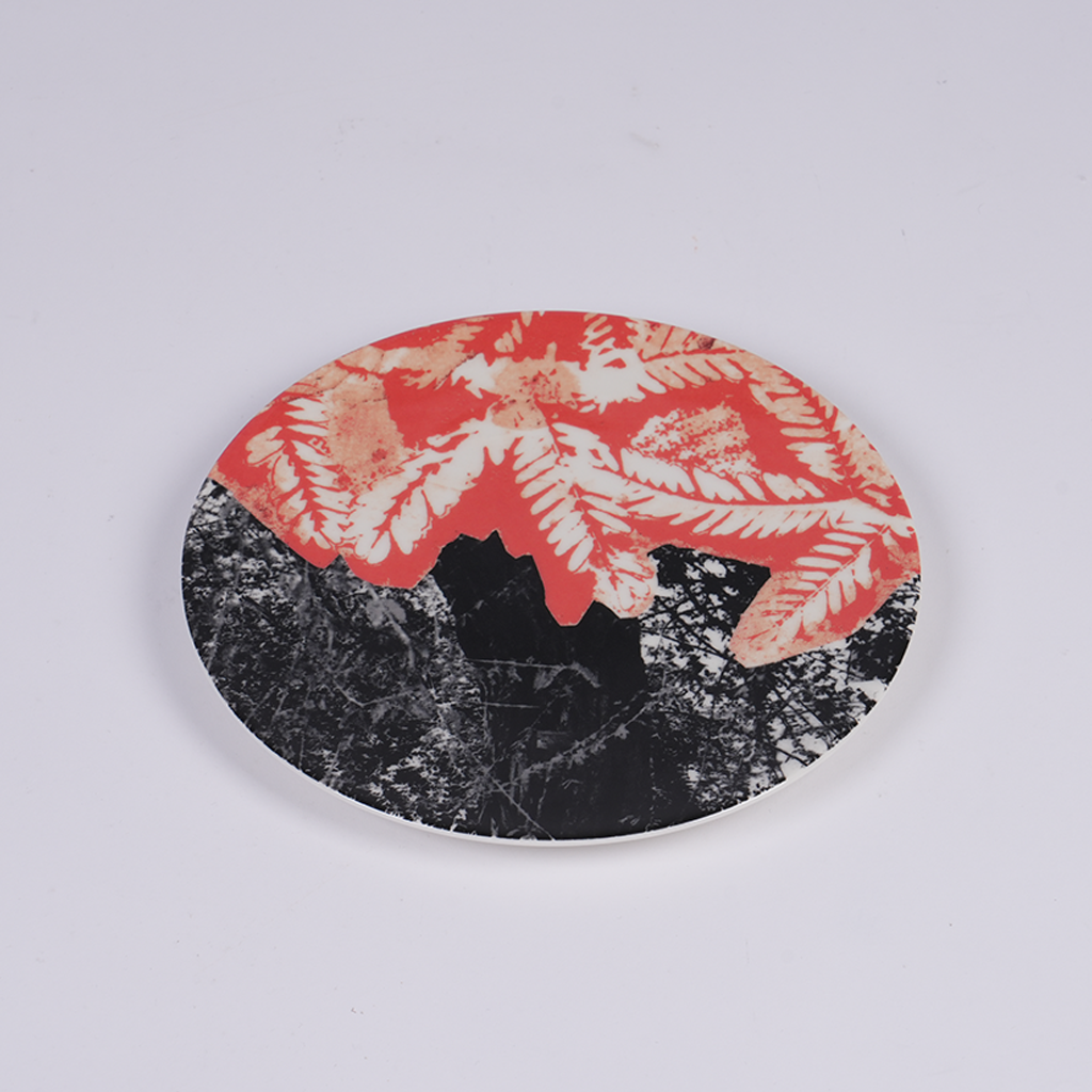 Set of four ceramic plates with Moza Al Falasi artwork from the Unfolding exhibition (view 3)