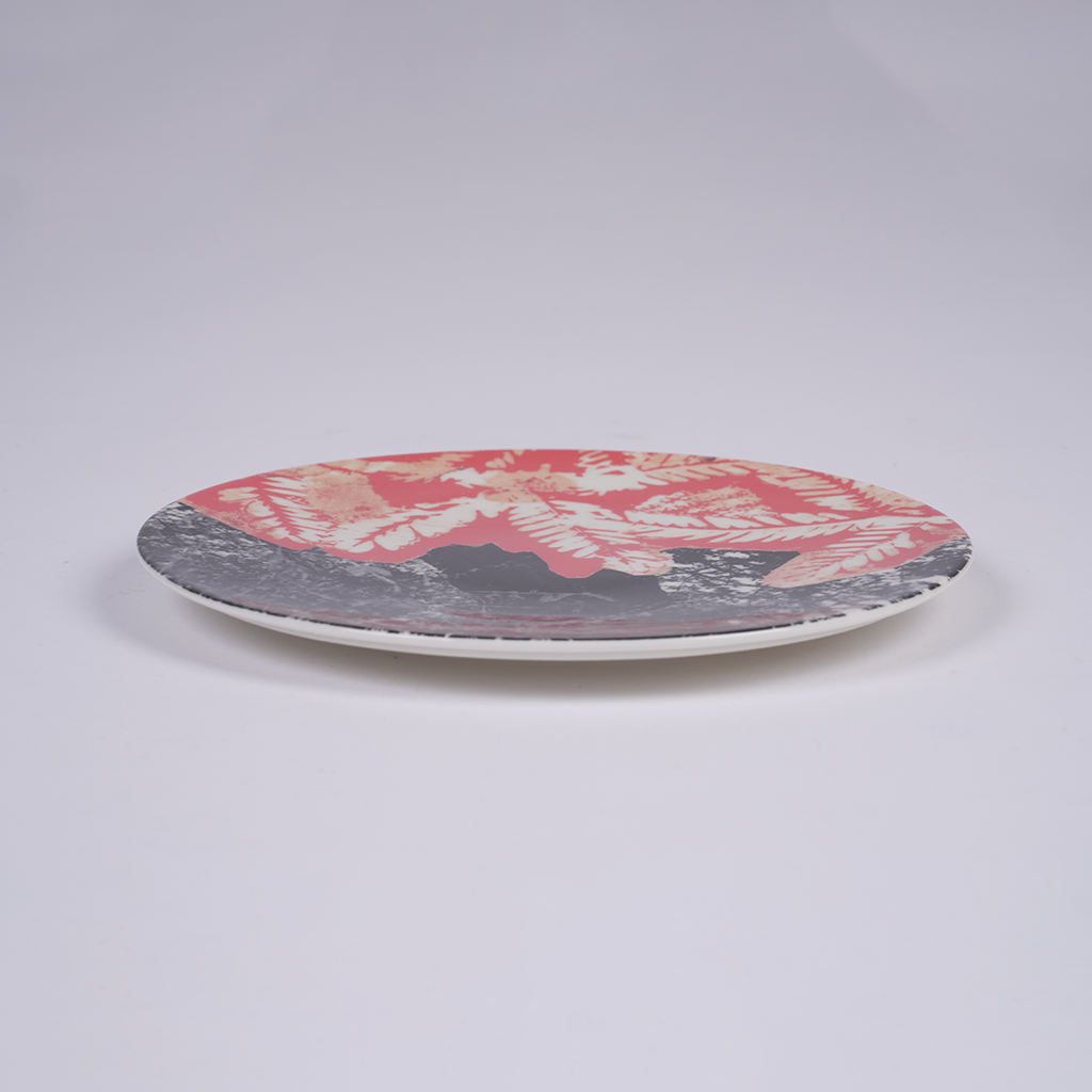 Set of four ceramic plates with Moza Al Falasi artwork from the Unfolding exhibition (view 4)