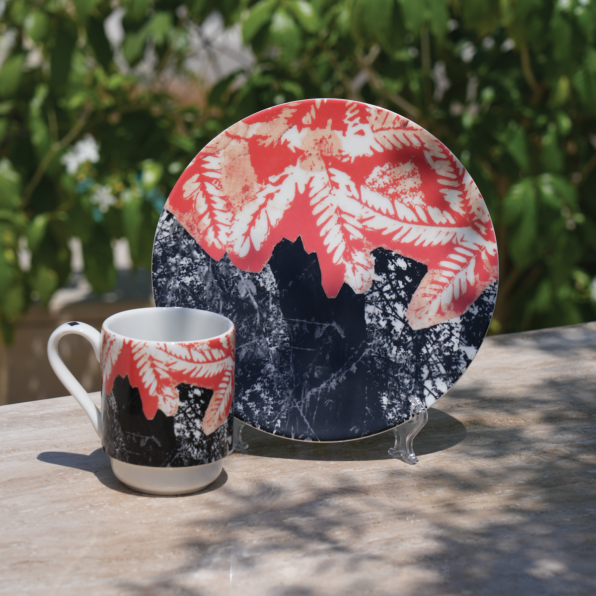 Ceramic mug and serving plate set with Moza Al Falasi artwork from the Unfolding exhibition (view 3)